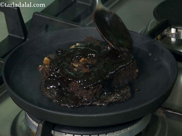 Step 22 – Top it with 2 more tbsp of the prepared chocolate sauce.