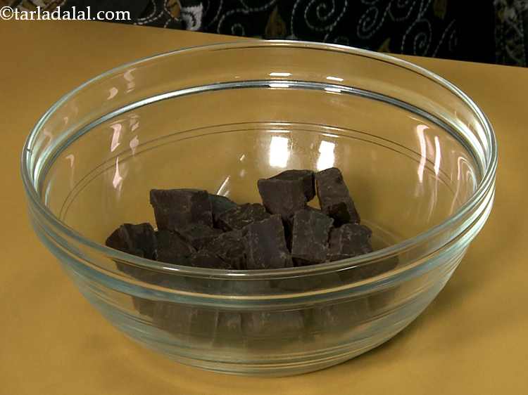Step 12 – In a microwave safe bowl, put the chocolate. Make sure you use good quality dark …