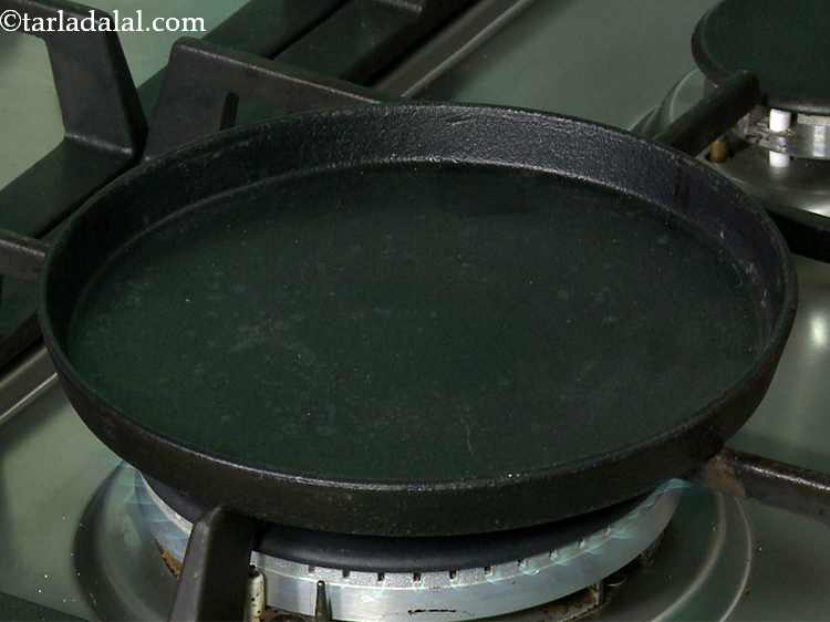 Step 17 – To make&nbsp;<strong>sizzling brownie recipe | eggless sizzling brownie | sizzling brownie with vanilla ice-cream |&nbsp;</strong>&nbsp;heat …