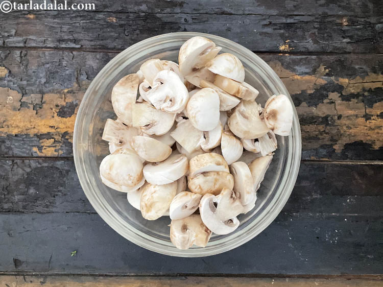 Step 16 – Next we need to cut the mushrooms. Here we have used 2 cups&nbsp;<a href="https://www.tarladalal.com/glossary-sliced-mushrooms-747i">sliced mushrooms …
