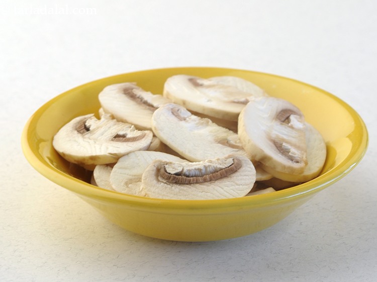 Step 41 – Add 1 cup&nbsp;<a href="https://www.tarladalal.com/glossary-sliced-mushrooms-747i">sliced mushrooms (khumbh)</a>.