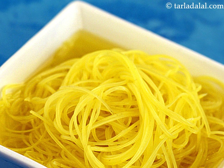 Step 25 – Also top with 1&nbsp;tbsp of soaked &nbsp;<a href="https://www.tarladalal.com/glossary-soaked-falooda-sev-1958i">soaked falooda sev</a>.