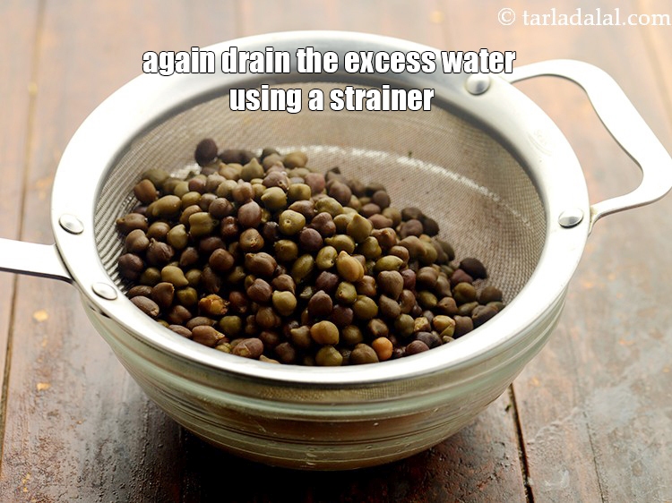 Step 15 – Again drain the excess water using a strainer. Keep the cooked green chickpeas aside.