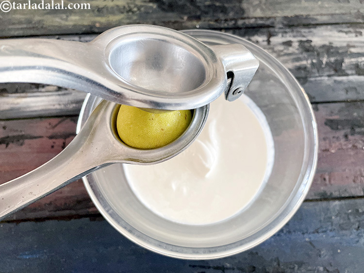 Step 25 – Add&nbsp;1 1/2 tbsp&nbsp;<a href="https://www.tarladalal.com/glossary-lemon-juice-numbi-ka-ras-nimbu-ka-juice-471i">lemon juice</a>. This will give the sour taste to our&nbsp;<strong>sour cream recipe</strong>.