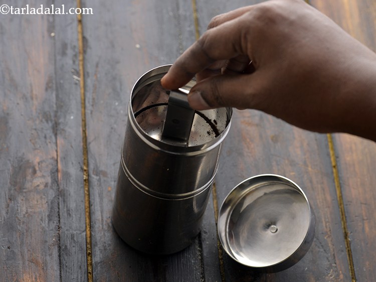 Step 7 – If the coffee powder is coarse, press tightly to get thick decoction.