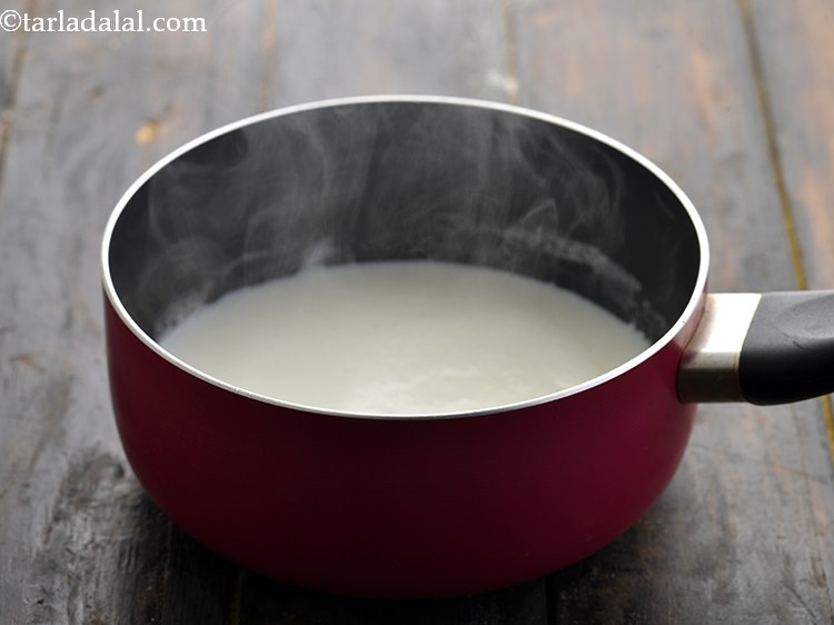 Step 22 – When the coffee is brewed, heat 1 cup of milk in the saucepan and bring …