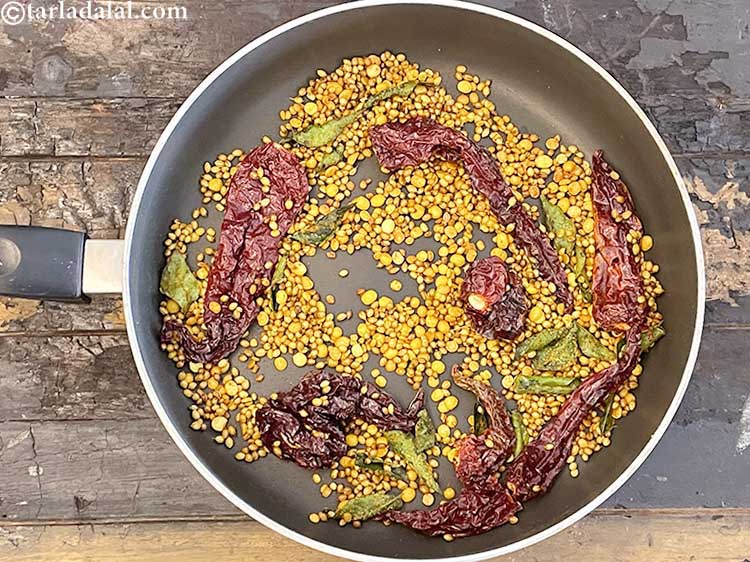 Step 15 – You have to saute till the dals turn light brown in colour. There is a …