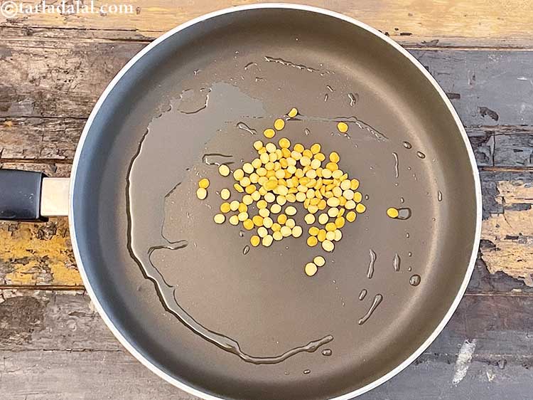 Step 3 – Add&nbsp;<meta charset="UTF-8" />1 tbsp&nbsp;<a href="glossary-chana-dal-split-bengal-gram-285i">chana dal (split bengal gram)</a>.