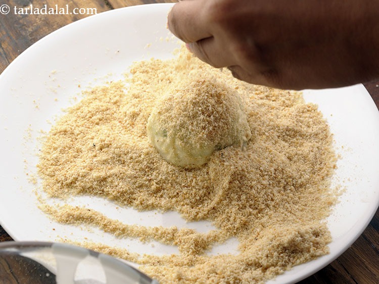 Step 31 – Roll it in bread crumbs till it is evenly coated from all the sides. Instead …