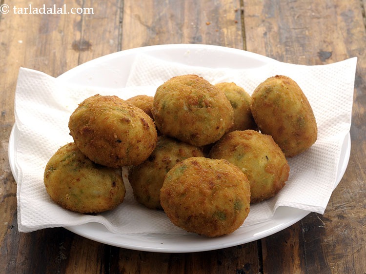 Step 36 – Rotate and cook evenly till golden brown from all the sides. Drain <strong>spaghetti balls</strong> on …