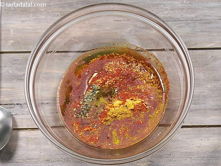 Step 14 – Add mustard oil. We have used a good amount of oil in this <strong>amla pickle</strong> …