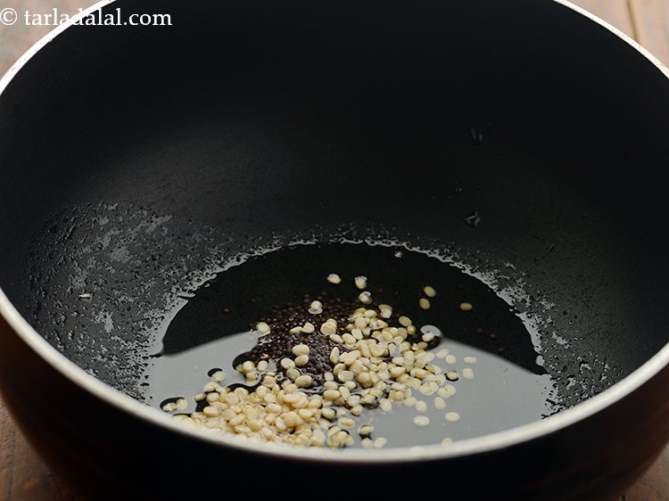 Step 3 – As the seeds splutter a little, add urad dal. It will add in a nice …