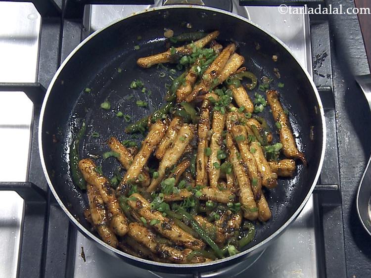 Step 22 – Garnish with spring onion greens.