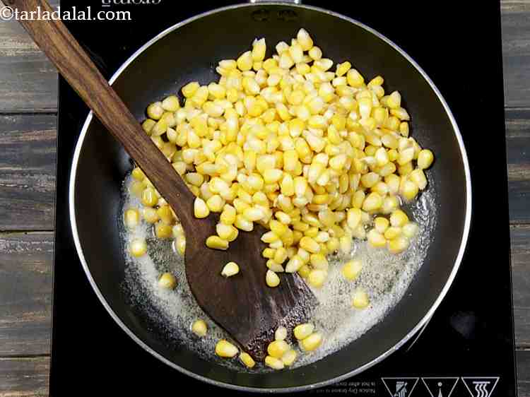 Step 3 – To make masala corn at home, heat the butter in a broad non-stick pan and …