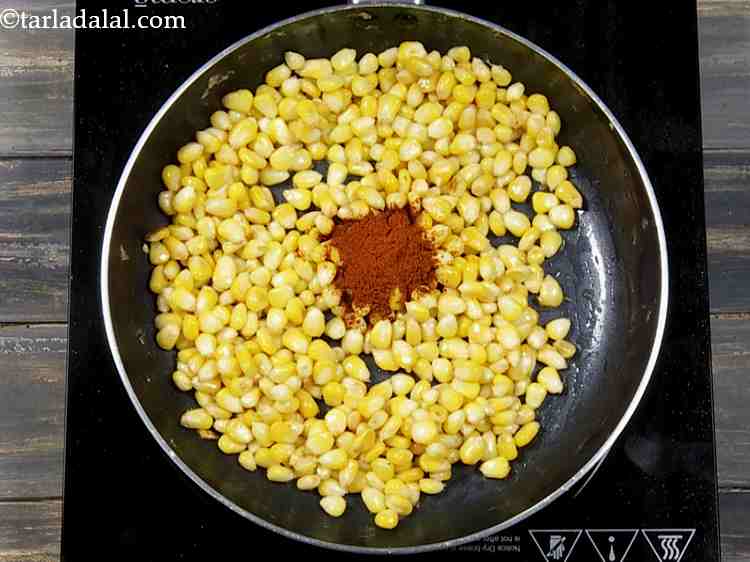 Step 5 – Switch off the flame and add the chilli powder immediately.