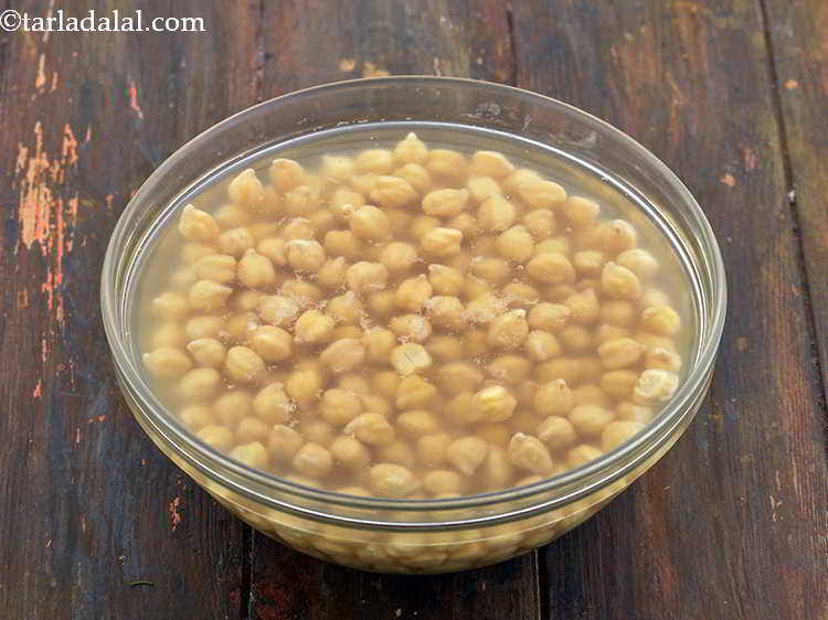 Step 3 – Cover with a lid and let it soak overnight. The chickpeas will double in size.&nbsp;