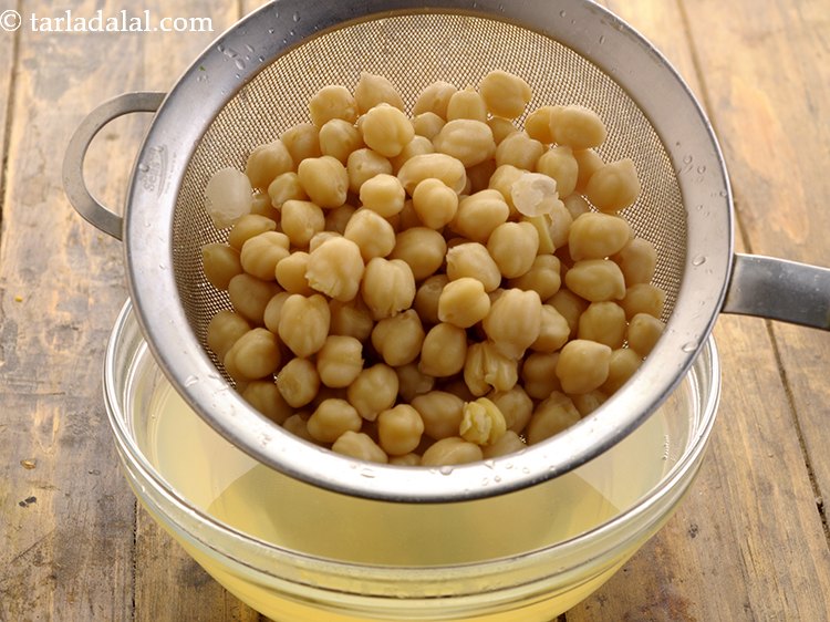 Step 8 – Drain the kabuli chana. Tip: Keep aside some cooking water of the chickpeas to add …