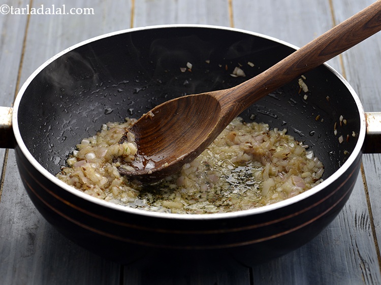 Step 18 – Saut&eacute; on a medium flame for 1 minute or till the raw aroma of adrak-lehsun …