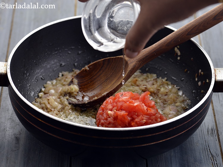 Step 20 – Add 2 tbsp of water for the tomatoes to cook faster and have a mushier …