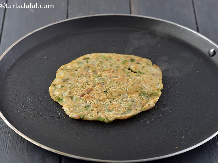 Step 14 – Flip it and cook on the other side using &frac14; tsp of oil. You can …