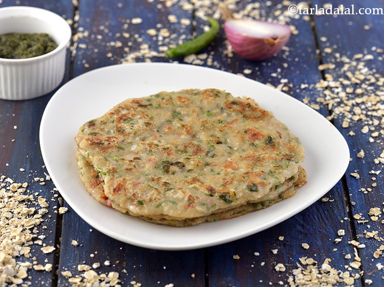 Step 17 – Serve the <strong>spicy Indian vegetable oats pancakes</strong> hot with <a href="https://www.tarladalal.com/Low-Calorie-Green-Chutney-Hari-Chutney-%E2%80%93-Diabetic-Friendly-3537r" target="_blank">green chutney</a>. If you …