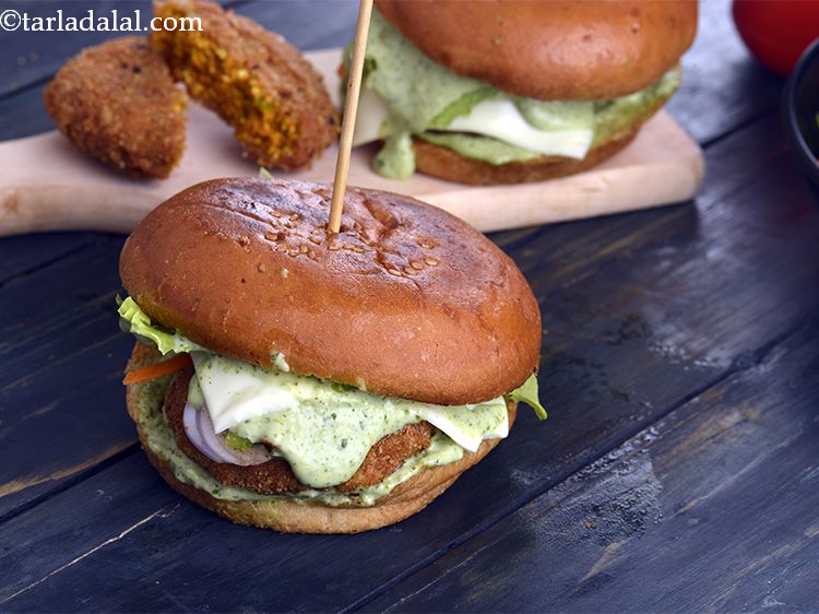 Step 62 – Serve the <strong>Spicy Paneer Burger</strong> immediately with <a href="https://www.tarladalal.com/Masala-French-Fries-4094r">Masala French fries</a> or Potato wafers.