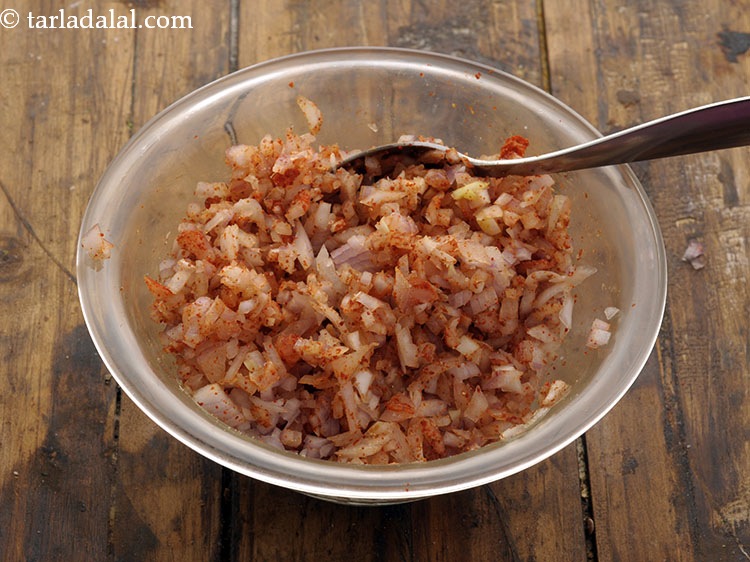 Step 39 – Mix well. This onion masala mixture is a crunchy element of <strong>spicy potato rolls</strong>.