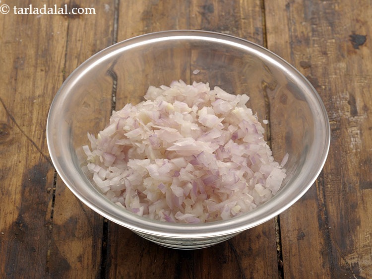 Step 35 – To prepare masala onion mixture, take &frac34; cup finely chopped onions in a bowl. If …