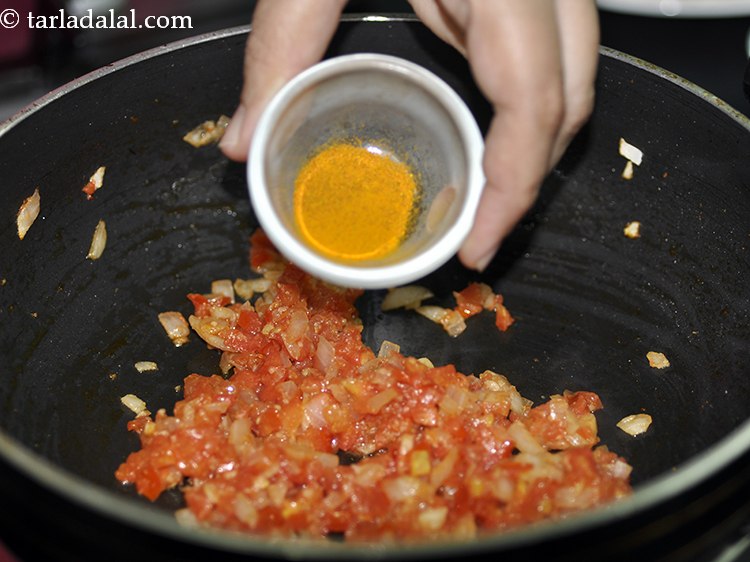 Step 16 – Now add spices to complete making spicy soya bhurji. Add turmeric powder.