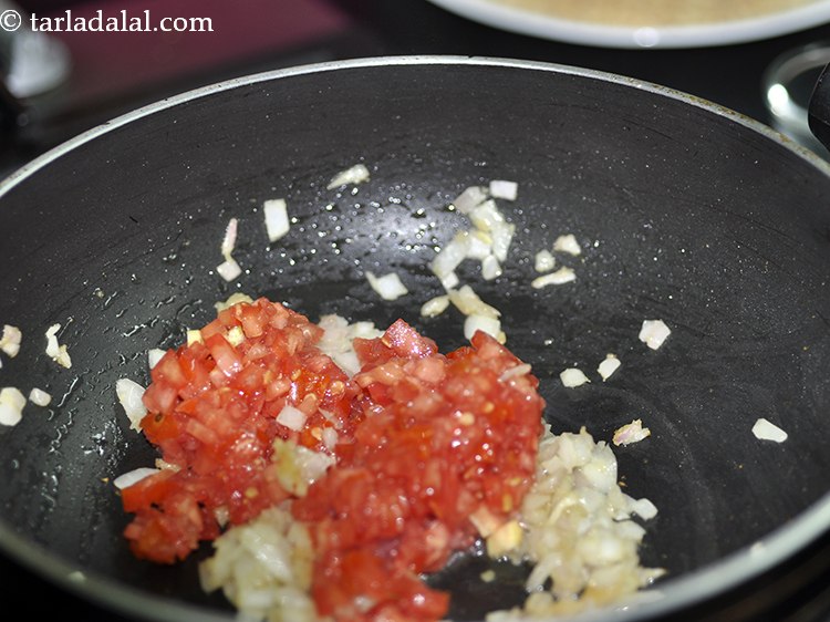 Step 15 – <div> Add the tomatoes. Prefer finely chopped tomatoes for a good mouthfeel.&nbsp;</div> <div> &nbsp;</div>