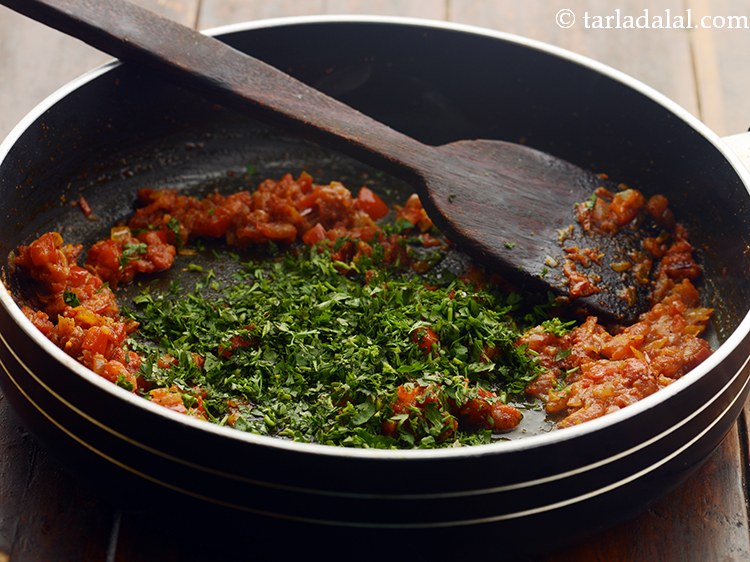 Step 16 – Add coriander for a burst of freshness.