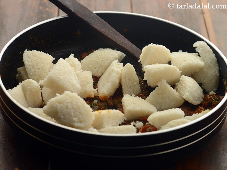 Step 22 – Add the idlis. <strong>Spicy tava idli</strong> is similar to masala pav, just that we replace …