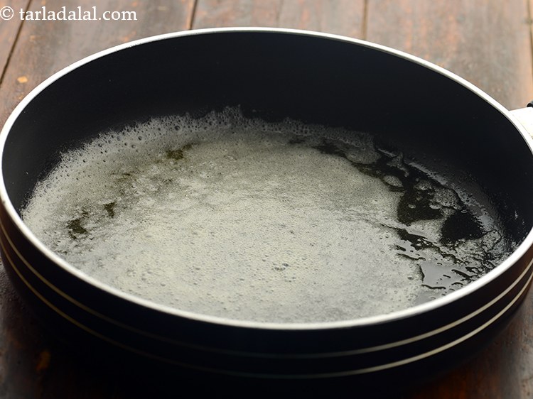 Step 2 – To prepare&nbsp;<strong>spicy tava idli</strong>, heat the butter in a broad non-stick pan. You can also …