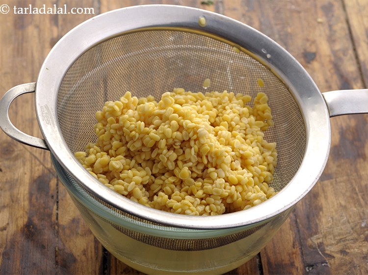 Step 24 – Drain the dal using a strainer and discard the water.