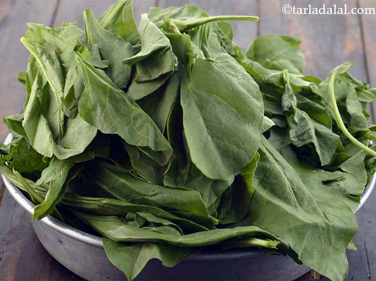 Step 22 – Remove the stems of the spinach and discard them.&nbsp;