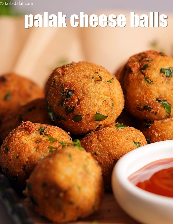 Step 16 – Serve <strong>spinach and cheese balls</strong> hot with <a href="https://www.tarladalal.com/glossary-tomato-ketchup-tomato-sauce-181i">tomato ketchup</a> or <a href="https://www.tarladalal.com/glossary-sweet-chilli-sauce-1306i">sweet chilli sauce</a>.