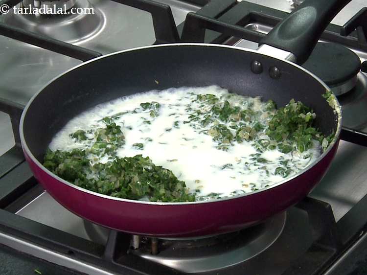 Step 26 – Add 1/2 cup&nbsp;<a href="https://www.tarladalal.com/glossary-milk-doodh-full-cream-milk-514i">milk</a>.