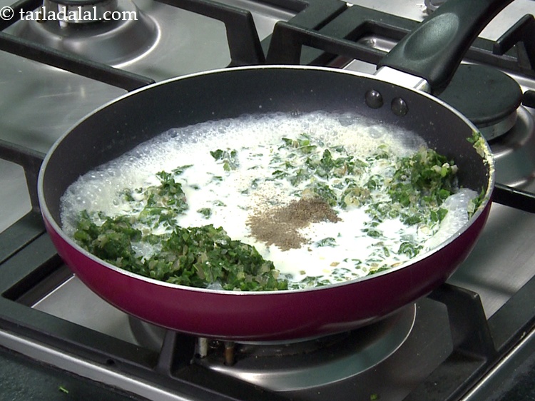 Step 28 – Add &nbsp;<a href="https://www.tarladalal.com/glossary-freshly-ground-black-pepper-kalimirch-powder-kali-mirch-ka-powder-567i">freshly ground black pepper (kalimirch)</a>&nbsp;to taste.