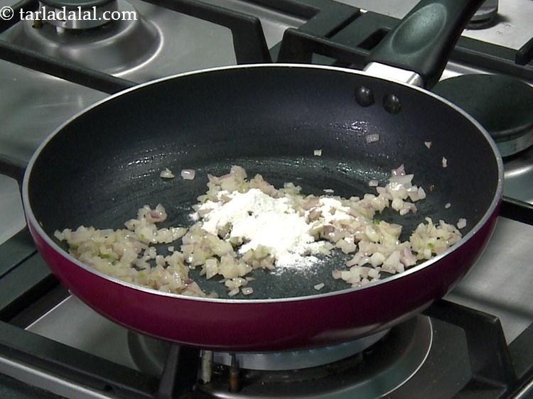 Step 8 – Add 1/2 tbsp&nbsp;<a href="https://www.tarladalal.com/glossary-plain-flour-maida-188i">plain flour (maida)</a>.&nbsp;