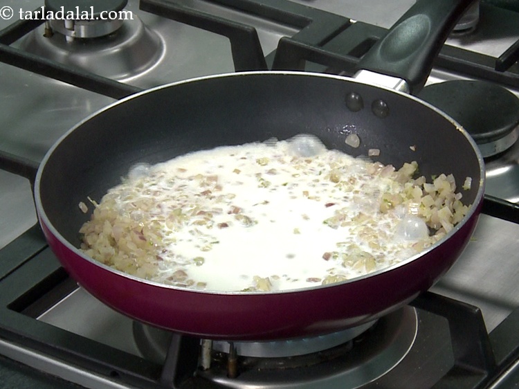 Step 10 – Add 1/2 cup&nbsp;<a href="https://www.tarladalal.com/glossary-milk-doodh-full-cream-milk-514i">milk</a>.