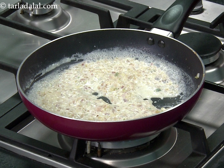 Step 11 – Mix well and cook on a medium flame for 30 seconds. Stir continuously so plain …