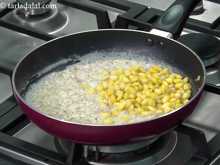 Step 12 – Add 1/2 cup&nbsp;<a href="https://www.tarladalal.com/glossary-boiled-sweet-corn-kernels-153i">boiled sweet corn kernels (makai ke dane)</a>.