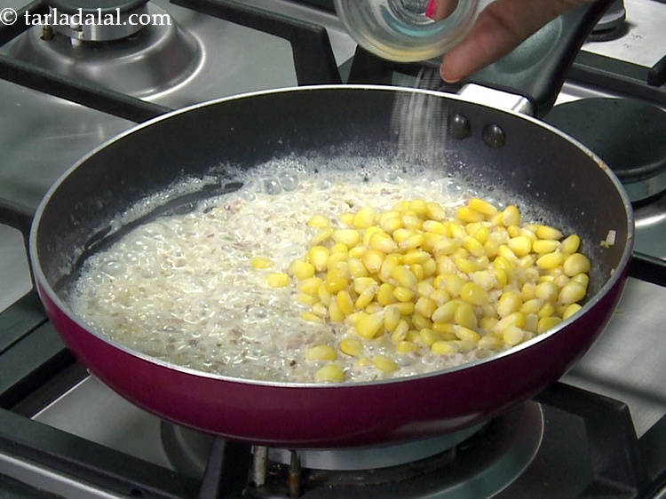 Step 13 – Add a pinch of&nbsp;<a href="https://www.tarladalal.com/glossary-sugar-chini-shakkar-278i">sugar</a>.