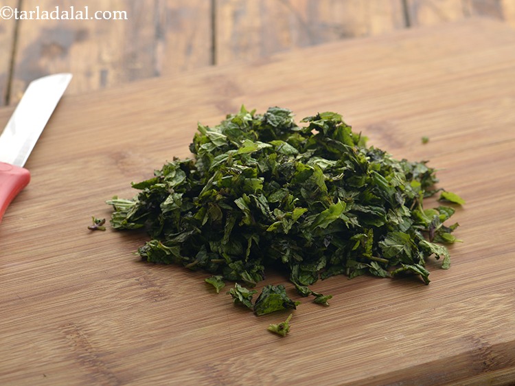 Step 13 – Finely chop the leaves to make it easier for blending. We will need around 1 …