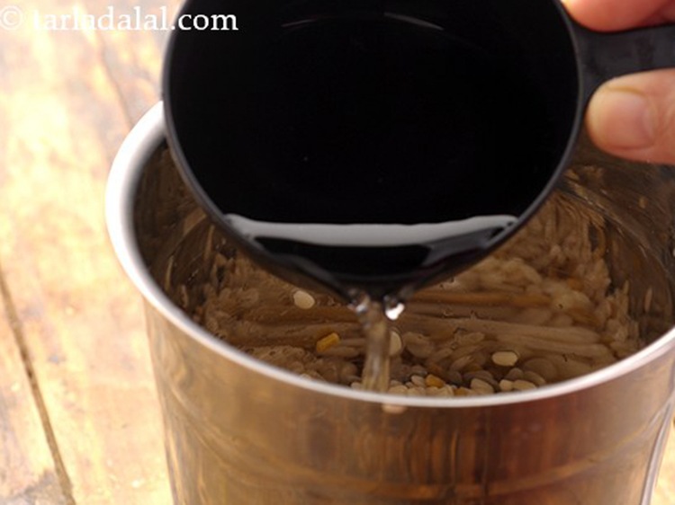 Step 10 – Transfer it to a mixer jar and add &frac12; cup of water for blending.