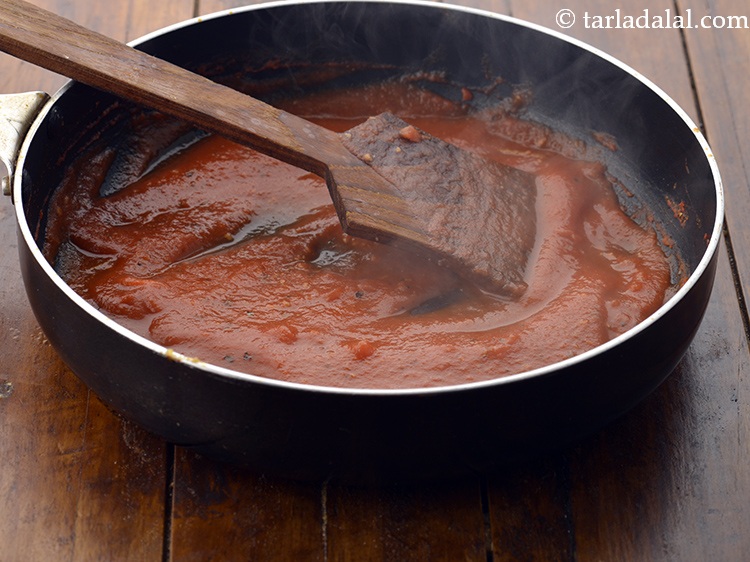 Step 55 – Mix well and cook on a medium flame for 3 minutes, while stirring continuously.