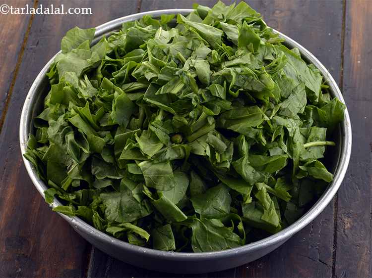 Step 24 – Drain well using a strainer. Roughly chop the spinach.<br /> &nbsp;