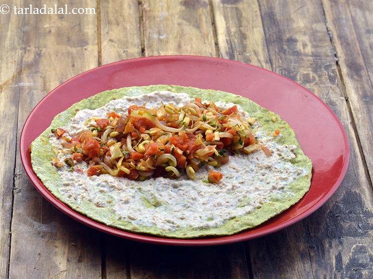 Step 32 – Spread a portion of the filling and then a little chilli-garlic paste on top of …