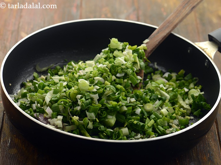Step 11 – Add spring onions.