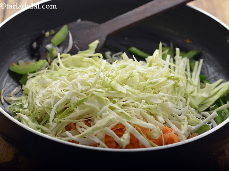 Step 9 – Add the cabbage. Can be substituted with red cabbage.